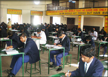 Classroom with students writing